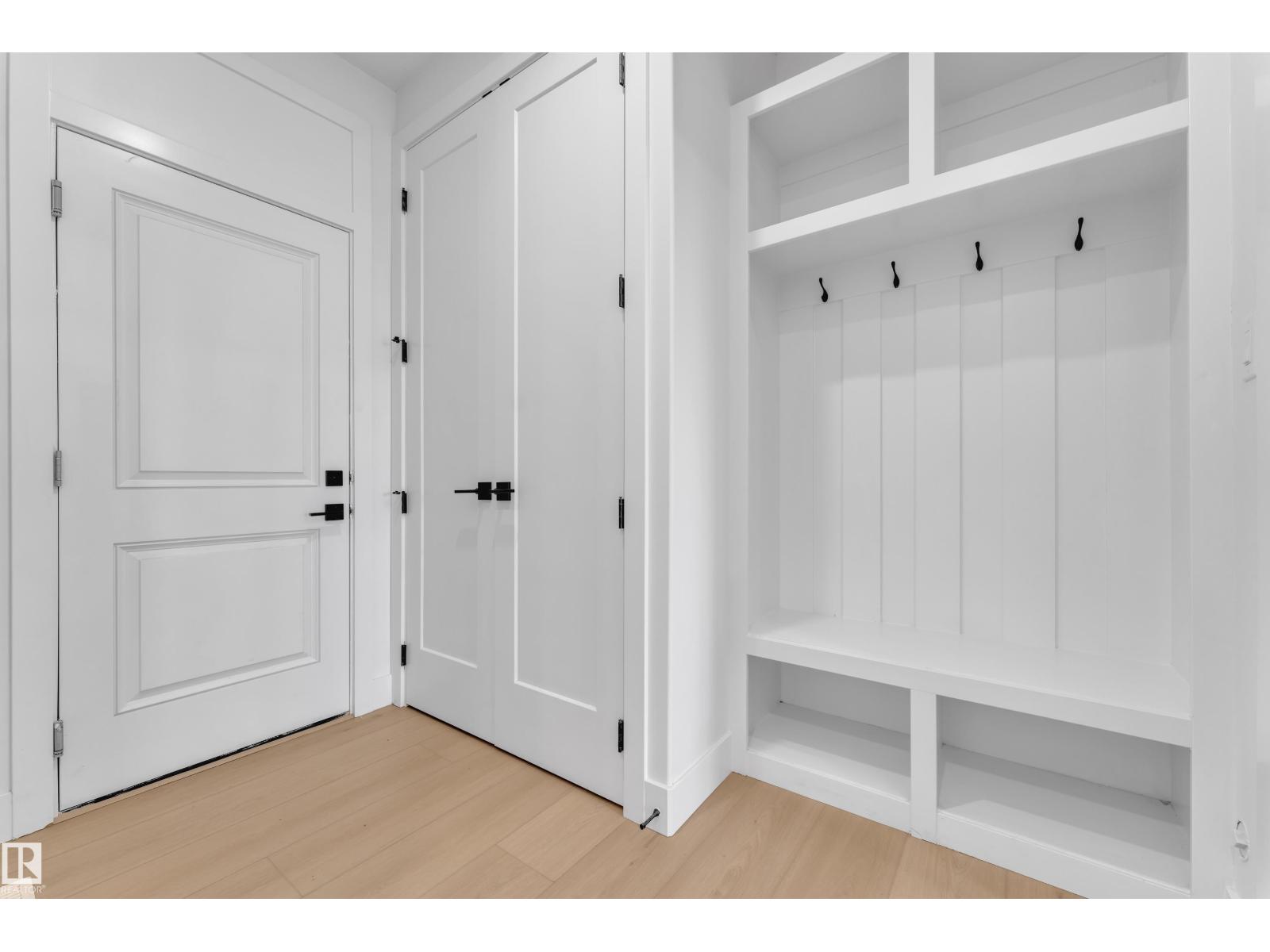 Mudroom built-in bench and hooks