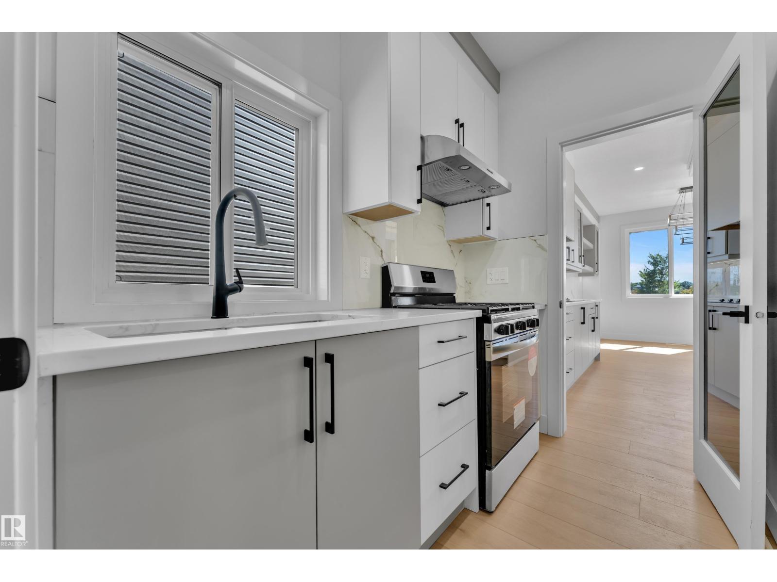 Kitchen sink beneath window
